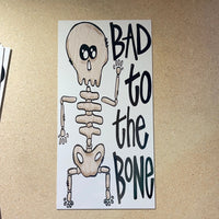 Thumbnail for Halloween Male Skeleton Bad To The Bone 12x6" Metal Wreath Sign - DECOE-079